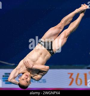 Doha, Qatar. 6 febbraio 2024. Shixin li dell'Australia gareggia nella 3m Spring Men Preliminary subacquea durante il 21° World Aquatics Championships presso l'Hamad Aquatic Center di Doha (Qatar), 6 febbraio 2024. Crediti: Insidefoto di andrea staccioli/Alamy Live News Foto Stock