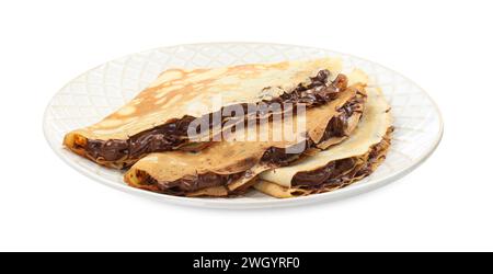 Crepes gustose con pasta di cioccolato isolata su bianco Foto Stock