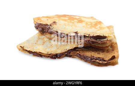Crepes gustose con pasta di cioccolato isolata su bianco Foto Stock