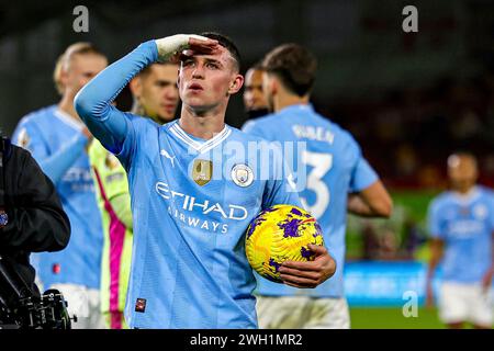 Firo : 05.01.2024, calcio, Premier LEAGUE, stagione 2023/2024, 23/24 English League, FC Brentford - Manchester City Phil Foden (47) del Manchester City festeggia a tempo pieno con il pallone Foto Stock