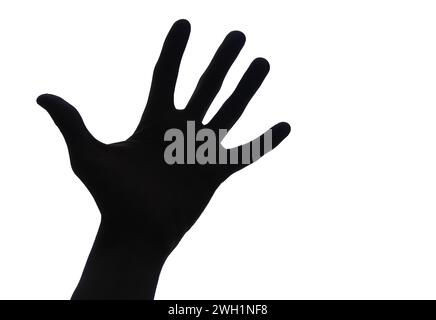 Sagoma di una mano umana nera isolata su sfondo bianco. Saluti, saluti Foto Stock