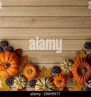 Vista dall'alto, decorazione di Halloween fatta di foglie autunnali e zucca su sfondo di legno. Disposizione piatta, vista dall'alto con spazio di copia. rendering 3d. Foto Stock