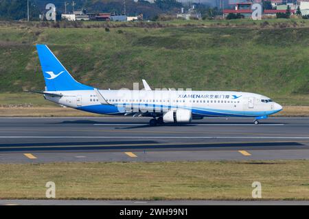 Atterraggio di aeromobili Boeing 737 di Xiamen Airlines. Aereo Boeing 737-800 di XiamenAir, noto anche come Xiamen Air. Foto Stock