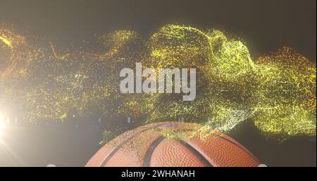 Immagine di particelle d'oro incandescenti che si muovono sul basket Foto Stock