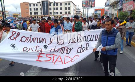 MARCHA-INDIGENA-CONTRA-INSEGURIDAD-TLC Latacunga, viernes 9vde febrero del 2024 Marcha indigena en contra de la inseguridad y del Tratado de Libre Comercio con China. Fotos: Rolando Enriquez/API Latacunga Cotopaxi Ecuador POL-MARCHA-INDIGENA-CONTRA-INSEGURIDAD-TLC-ed893238ca4a050d532c2d926d30f3df *** MARCIA INDIGENA CONTRO l'INSICUREZZA FTA Latacunga, venerdì 9 febbraio 2024 marcia INDIGENA CONTRO l'INSICUREZZA e l'accordo di libero scambio con la Cina Foto Stock