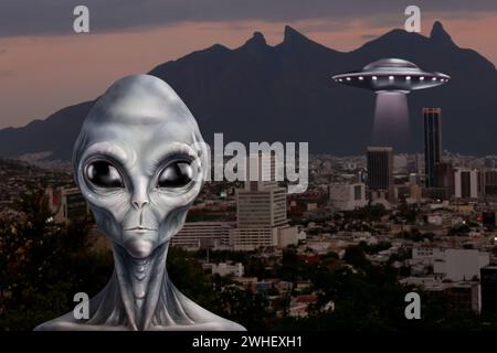 Alieno e disco volante in città. UFO, visitatori extraterrestri Foto Stock