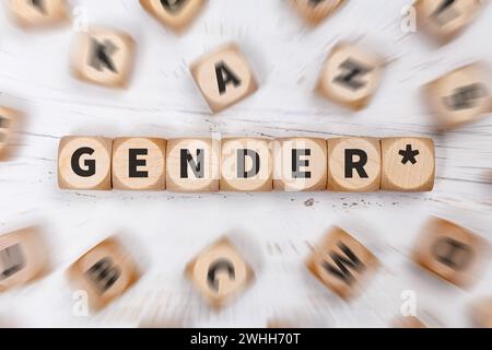 Stoccarda, Germania - 24 gennaio 2024: Gendering with Gendersternchen as Symbol for Gender-appropriate Language on Cubes Communication Concept in Stut Foto Stock