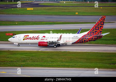 Changi, Singapore - 3 febbraio 2023: Un Boeing 737-800 della Batik Air Indonesia con il numero di registrazione PK-BGJ all'aeroporto di Changi (SIN) in Foto Stock