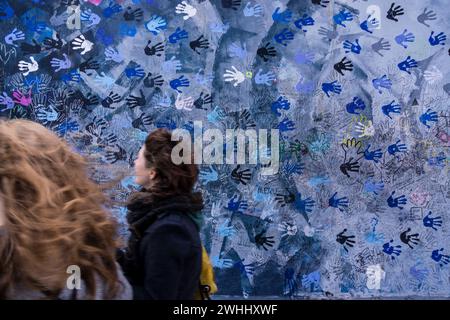 Manos azules Foto Stock