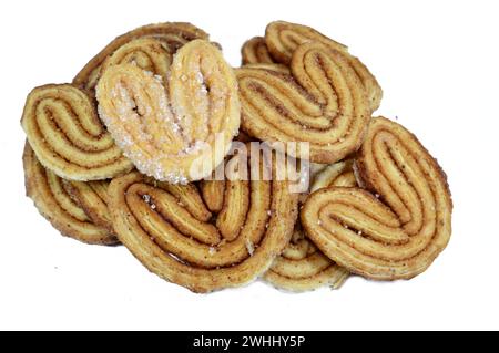 palmier, abbreviazione di foglie di palma feuille de palmier, biscotti francesi a cuori, i Palmiers sono fatti di pasta sfoglia, un impasto laminato simile al dou Foto Stock