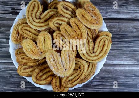 palmier, abbreviazione di foglie di palma feuille de palmier, biscotti francesi a cuori, i Palmiers sono fatti di pasta sfoglia, un impasto laminato simile al dou Foto Stock