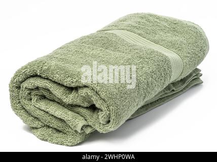 Telo di spugna verde intrecciato su sfondo bianco Foto Stock