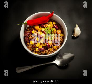 Chili con carne sul nero Foto Stock