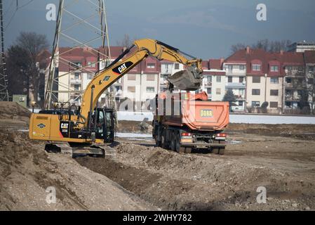Escavatore a marchio Caterpillar Foto Stock
