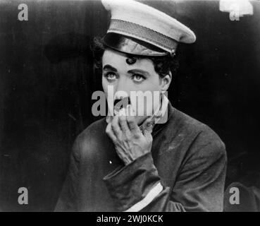 Charlie Chaplin in banca, 1915 anni Foto Stock