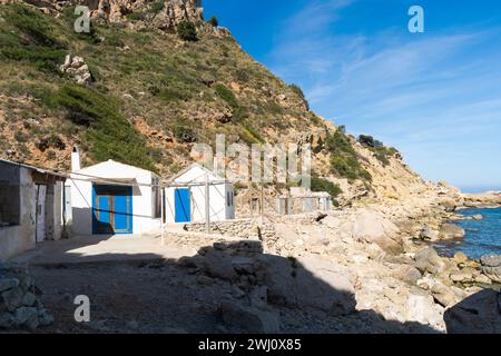 Vecchie case di pescatori a Cala Llebeig. Benitachell - Alicante - Spagna Foto Stock