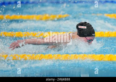 Doha, Qatar. 12 febbraio 2024. Angelina Kohler, tedesca, gareggia durante la finale femminile di nuoto dei 100 m farfalla ai Campionati mondiali di nuoto 2024 a Doha, Qatar, 12 febbraio 2024. Crediti: Xue Yuge/Xinhua/Alamy Live News Foto Stock