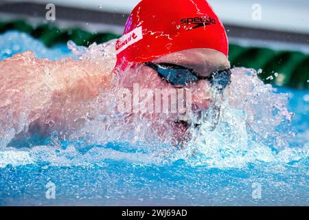 Doha, Qatar. 13 febbraio 2024. Max Litchfield della Gran Bretagna gareggia nel campionato di nuoto maschile 200m Butterfly Preliminary durante il 21° Campionato Mondiale di Aquatics all'Aspire Dome di Doha (Qatar), 13 febbraio 2024. Crediti: Insidefoto di andrea staccioli/Alamy Live News Foto Stock