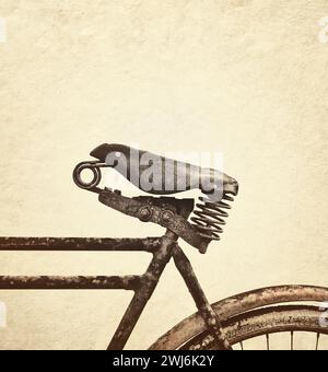 Immagine retrò di un sedile per bicicletta vintage in pelle intemprata Foto Stock