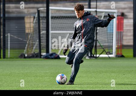 Landore, Swansea, Galles. 11 febbraio 2024. Alex Lang Swansea City Academy portiere Coach durante il riscaldamento pre-partita prima dell'amichevole Under 14 tra Swansea City e Kidderminster Harriers alla Swansea City Academy di Landore, Swansea, Galles, Regno Unito, l'11 febbraio 2024. Crediti: Duncan Thomas/Majestic Media. Foto Stock