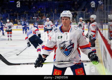 San Pietroburgo, Russia. 13 febbraio 2024. Giocatore del Lada Hockey Club, Scott Kosmachuk (24) visto in azione durante la Kontinental Hockey League, stagione regolare KHL 2023 - 2024 tra SKA San Pietroburgo - Lada Tolyatti alla SKA Arena. (Punteggio finale; SKA San Pietroburgo 2:1 Lada Tolyatti) credito: SOPA Images Limited/Alamy Live News Foto Stock