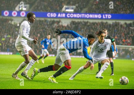 Glasgow, Regno Unito. 14 febbraio 2024. I Rangers FC giocano contro la Ross County all'Ibrox Stadium di Glasgow, in Scozia, in una partita riorganizzata, che è stata posticipata il 27 dicembre 2023, a causa della neve. I Rangers sono attualmente 3 punti dietro il Celtic FC, che è in cima alla Scottish League e una vittoria dei Rangers per 3 o più gol li metterebbe al primo posto. Crediti: Findlay/Alamy Live News Foto Stock