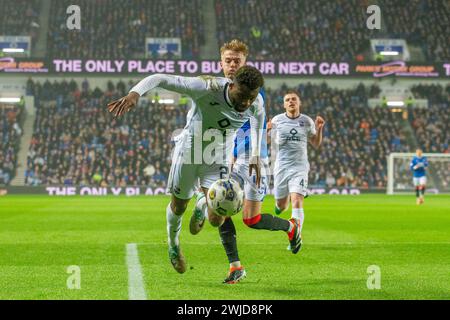 Glasgow, Regno Unito. 14 febbraio 2024. I Rangers FC giocano contro la Ross County all'Ibrox Stadium di Glasgow, in Scozia, in una partita riorganizzata, che è stata posticipata il 27 dicembre 2023, a causa della neve. I Rangers sono attualmente 3 punti dietro il Celtic FC, che è in cima alla Scottish League e una vittoria dei Rangers per 3 o più gol li metterebbe al primo posto. Crediti: Findlay/Alamy Live News Foto Stock