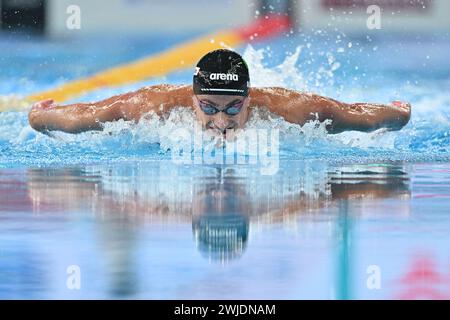 Doha, Qatar. 14 febbraio 2024. Alberto Razzetti d'Italia gareggia durante la finale maschile di nuoto dei 200 m farfalla ai Campionati mondiali di nuoto 2024 a Doha, Qatar, 14 febbraio 2024. Crediti: Xue Yuge/Xinhua/Alamy Live News Foto Stock