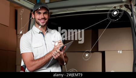 Immagine di una rete di connessioni con icone su uomo di consegna caucasico Foto Stock