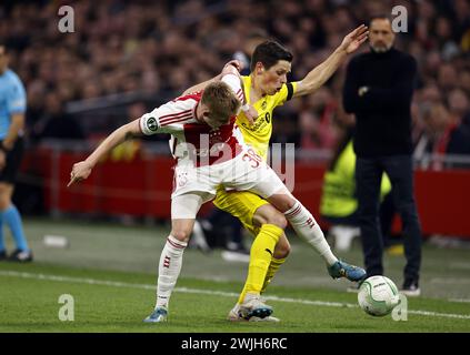 AMSTERDAM - (l-r) Kristian Hlynsson di Ajax, Sondre Brunstad FET di FK Bodø/Glimt durante la partita di play-off della UEFA Conference League tra Ajax Amsterdam e Bodo/Glimt alla Johan Cruijff Arena il 15 febbraio 2024 ad Amsterdam, Paesi Bassi. ANP MAURICE VAN STEEN Foto Stock