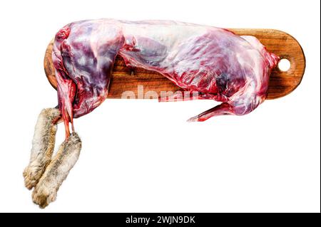 Lepre selvatica di tutta la foresta, carne cruda su ponte di legno, vecchio tavolo rustico nero. Isolato su sfondo bianco. Vista dall'alto. Foto Stock