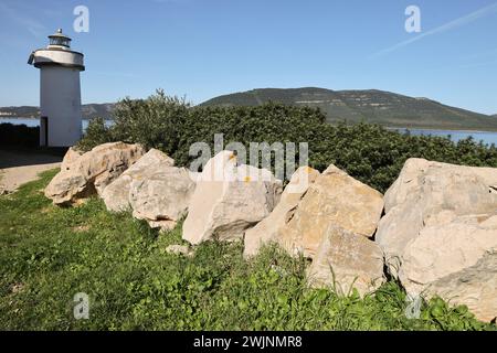 Punta Giglio - Torre del faro. Punta Giglio è un'area protetta all'interno del Parco di Porto Conte a soli 17 km da Alghero con un piccolo museo dedicato Foto Stock