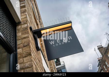 Cartello Wear London Men's Clothing Shop in Berwick Street London Soho W1, Inghilterra, Regno Unito Foto Stock