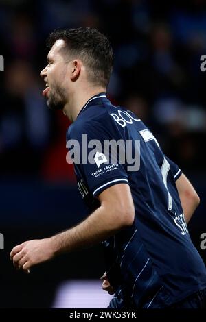 Bochum, Deutschland, 1. Fussball Bundesliga 22. Spieltag VFL Bochum : FC Bayern München 3:2 18. 02. 2024 im Vonovia Ruhrstadion in Bochum Kevin Stöger (STOEGER) (VFL) streckt nach seinem Treffer zum 3-1 den Bayern die Zunge heraus foto: Norbert Schmidt, Duesseldorf Foto Stock