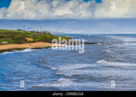 Prima tappa sulla strada di Hana tour, Ho'okipa Beach Park, famosa per i surfisti e spiagge di sabbia bianca. Foto Stock