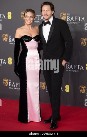 Londra, Regno Unito. 18 febbraio 2024. Nella foto: (L-R) - Margot Robbie e il marito Tom Ackerley partecipano all'EE British Academy Film Awards 2024. Credito: Justin ng/ Foto Stock