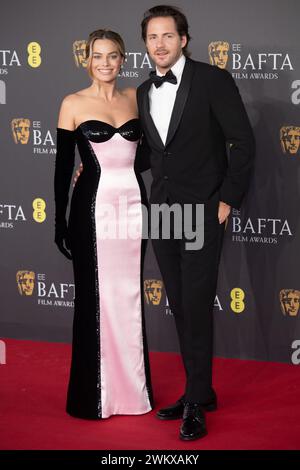 Londra, Regno Unito. 18 febbraio 2024. Nella foto: (L-R) - Margot Robbie e il marito Tom Ackerley partecipano all'EE British Academy Film Awards 2024. Credito: Justin ng/ Foto Stock