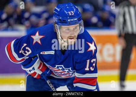21 febbraio 2024: Linus Weissbach (13), attaccante dei Rochester Americans, pattina il secondo periodo contro i Belleville Senators. I Rochester Americans ospitarono i Belleville Senators in una partita della American Hockey League alla Blue Cross Arena di Rochester, New York. (Jonathan tenca/CSM) Foto Stock