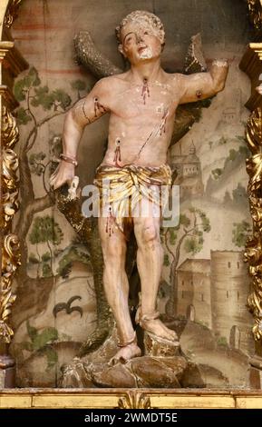 san Cristiano e martire San Sebastiano scultura in legno da vicino Colegiato della chiesa di San Miguel Aguilar de Campoo Palencia Castiglia e León Spagna Foto Stock