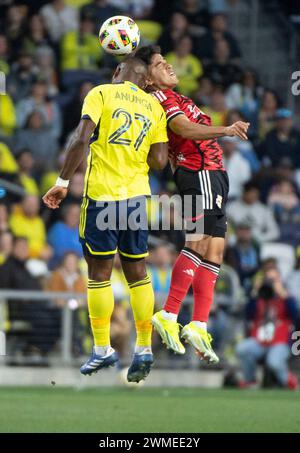 Nashville, Tennessee, Stati Uniti. 25 febbraio 2024. Il centrocampista del Nashville SC Brian Anunga (27) dirige la palla durante la sua partita a Nashville. (Credit Image: © Camden Hall/ZUMA Press Wire) SOLO PER USO EDITORIALE! Non per USO commerciale! Crediti: ZUMA Press, Inc./Alamy Live News Foto Stock