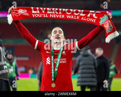 (240226) -- LONDRA, 26 febbraio 2024 (Xinhua) Kostas Tsimikas del Liverpool celebra dopo la finale della English Football League Cup tra Chelsea e Liverpool a Londra, Regno Unito, il 25 febbraio 2024. (XINHUA)SOLO PER USO EDITORIALE. NON IN VENDITA PER CAMPAGNE PUBBLICITARIE O DI MARKETING. DIVIETO DI UTILIZZO CON AUDIO, VIDEO, DATI, ELENCHI DI INCONTRI, LOGHI CLUB/LEAGUE O SERVIZI "LIVE" NON AUTORIZZATI. UTILIZZO ONLINE IN-MATCH LIMITATO A 45 IMMAGINI, SENZA EMULAZIONE VIDEO. NON È CONSENTITO L'USO IN SCOMMESSE, GIOCHI O PUBBLICAZIONI PER SINGOLI CLUB/CAMPIONATO/GIOCATORI. Foto Stock