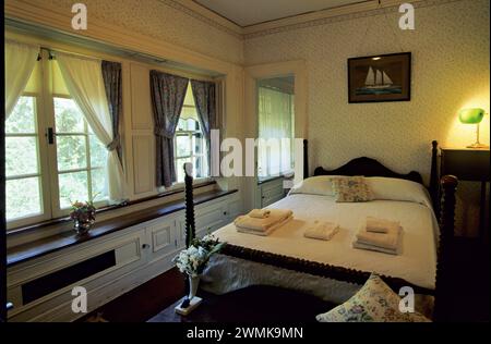 Un'accogliente camera da letto attende i viaggiatori in un albergo: Cumberland Island, Sea Islands, Georgia, Stati Uniti d'America Foto Stock