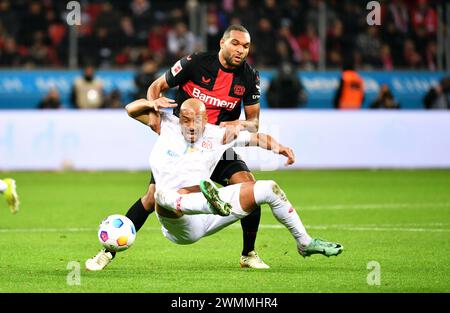 Bundesliga, BayArena Leverkusen; Bayer Leverkusen vs FSV Mainz 05; Jonathan Tah (LEV), Karim Onisiwo (M05) Foto Stock