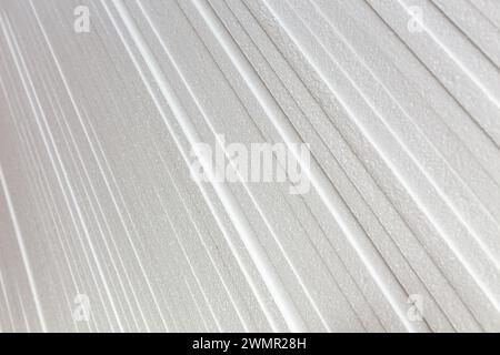 Sfondo con pannelli impilati di polistirolo. Produzione industriale di pannelli isolanti in polistirene espanso o piastre in polistirene espanso. Edificio Foto Stock