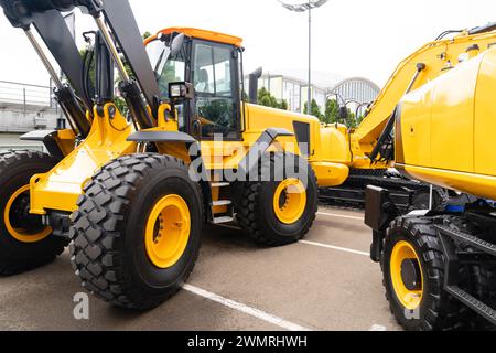 Flotta di macchine da costruzione gialle. Foto Stock