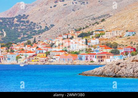 Grecia, isole del Dodecaneso, isola di Halki, veduta del porto di Emporio Foto Stock