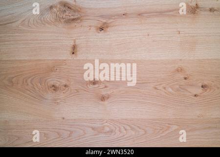Pavimento in laminato di legno. Fondo in legno ruvido per pavimenti interni Foto Stock
