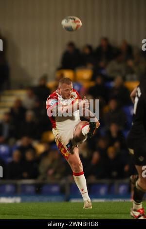 London, UK. 25th Feb, 2024. Jordan Abdull of Catalan Dragons kicks the ball during the Super League match between London Broncos and Catalan Dragons at Plough Lane, London, England on 23 February 2024. Photo by Ken Sparks. Editorial use only, license required for commercial use. No use in betting, games or a single club/league/player publications. Credit: UK Sports Pics Ltd/Alamy Live News Stock Photo