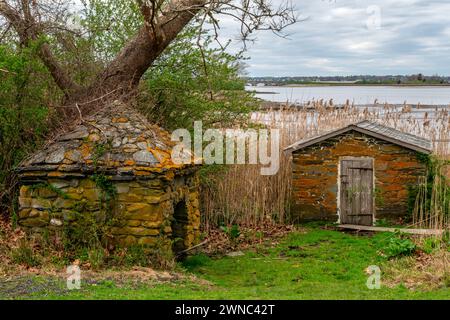 Una piccola casa di pietra Foto Stock