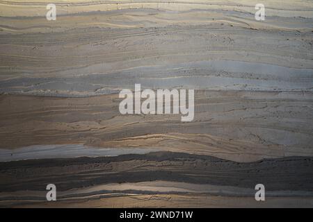 Pareti in marmo beige e nero ondulato Foto Stock